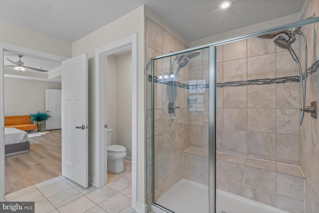 10648 Cheryl Turn, Waldorf, MD 20603 - ensuite bathroom featuring a stall shower, toilet, tile patterned floors, a ceiling fan, and recessed lighting