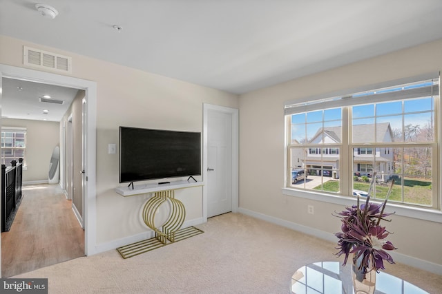 10648 Cheryl Turn, Waldorf, MD 20603 - living area with baseboards and carpet flooring