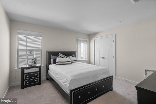 10648 Cheryl Turn, Waldorf, MD 20603 - bedroom with carpet floors, baseboards, and a closet