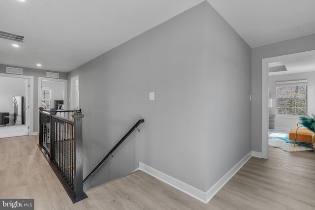 10648 Cheryl Turn, Waldorf, MD 20603 - corridor with an upstairs landing, light wood-style flooring, baseboards, and recessed lighting