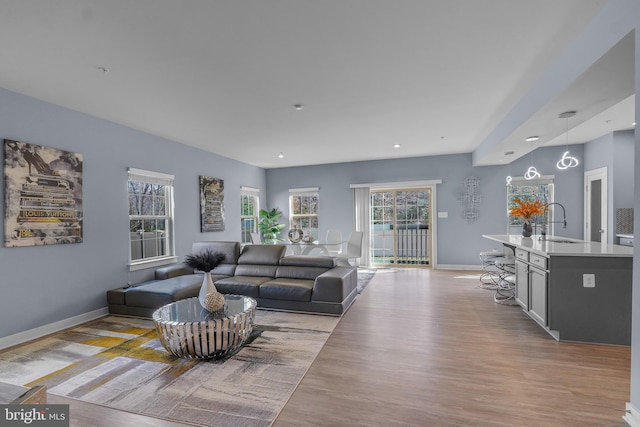 10648 Cheryl Turn, Waldorf, MD 20603 - living room featuring light wood-style flooring, recessed lighting, and baseboards
