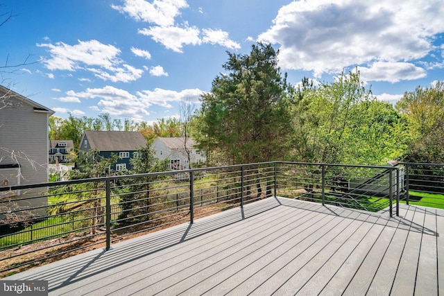 wooden deck with a residential view