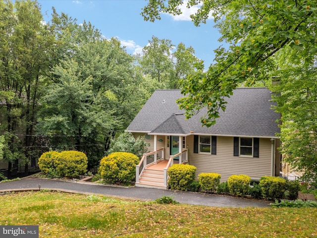 1018 Plum Creek Dr, Crownsville, MD 21032 - view of front of house with roof with shingles and a front lawn