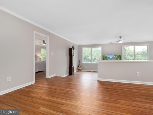 1018 Plum Creek Dr, Crownsville, MD 21032 - spare room featuring ceiling fan, crown molding, baseboards, and light wood-style flooring