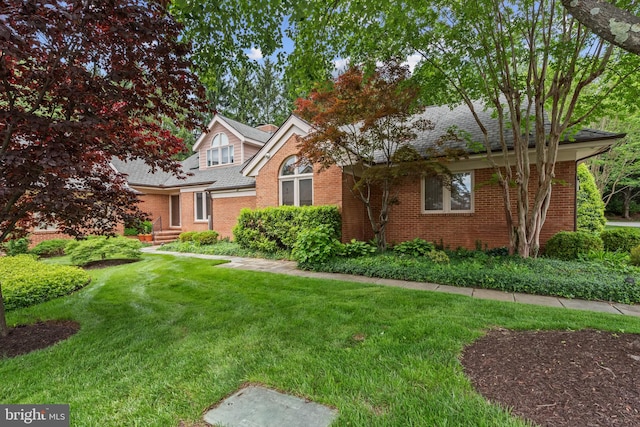 2 Fieldspring Ct, Lutherville Timonium, MD 21093 - view of front of home with brick siding, a front lawn, and roof with shingles