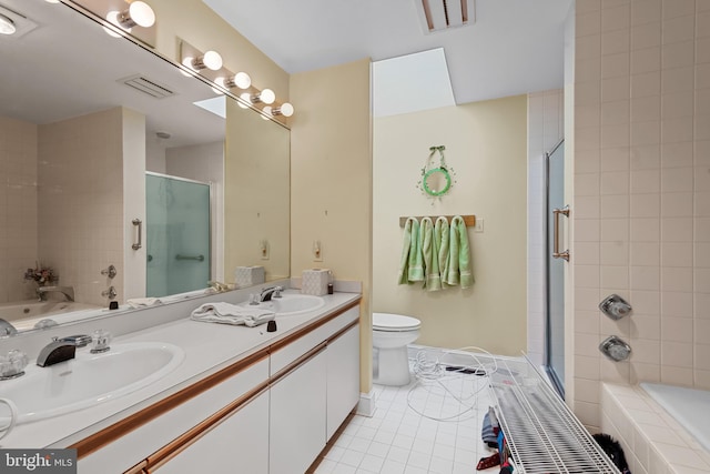 2 Fieldspring Ct, Lutherville Timonium, MD 21093 - bathroom featuring a relaxing tiled tub, tiled shower, double vanity, tile patterned floors, and toilet