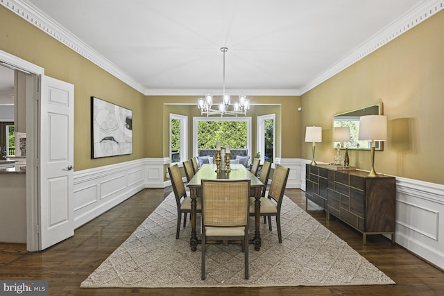 1016 Bellview Rd, Mclean, VA 22102 - dining room with a decorative wall, a chandelier, ornamental molding, dark wood finished floors, and wainscoting