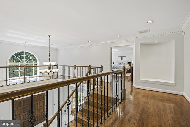 1016 Bellview Rd, Mclean, VA 22102 - hall featuring a chandelier, ornamental molding, an upstairs landing, wood finished floors, and recessed lighting