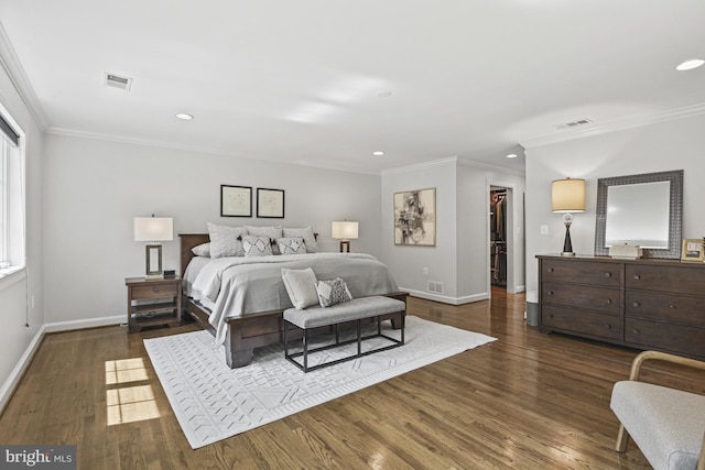 1016 Bellview Rd, Mclean, VA 22102 - bedroom with ornamental molding, recessed lighting, dark wood-type flooring, a walk in closet, and a closet