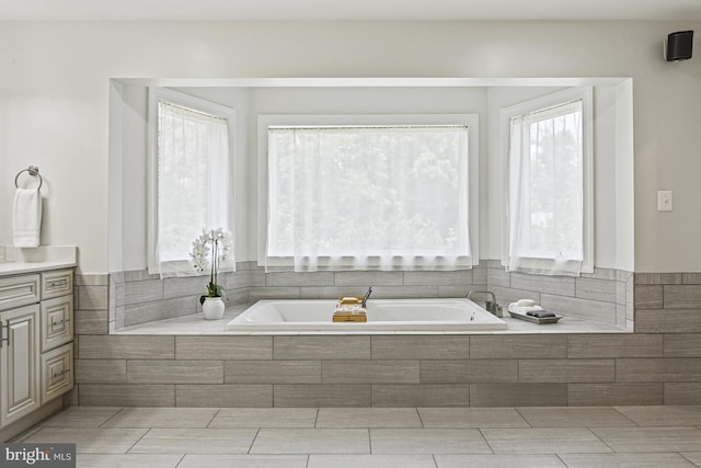 1016 Bellview Rd, Mclean, VA 22102 - bathroom featuring plenty of natural light, a garden tub, and vanity