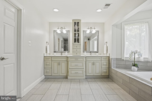 1016 Bellview Rd, Mclean, VA 22102 - bathroom with double vanity and tiled bath