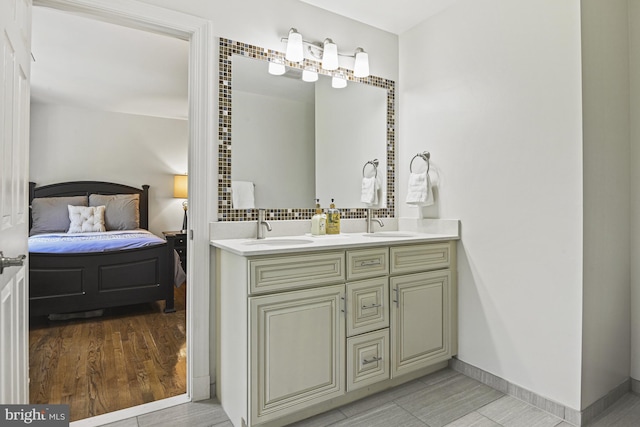 1016 Bellview Rd, Mclean, VA 22102 - ensuite bathroom with double vanity and tasteful backsplash
