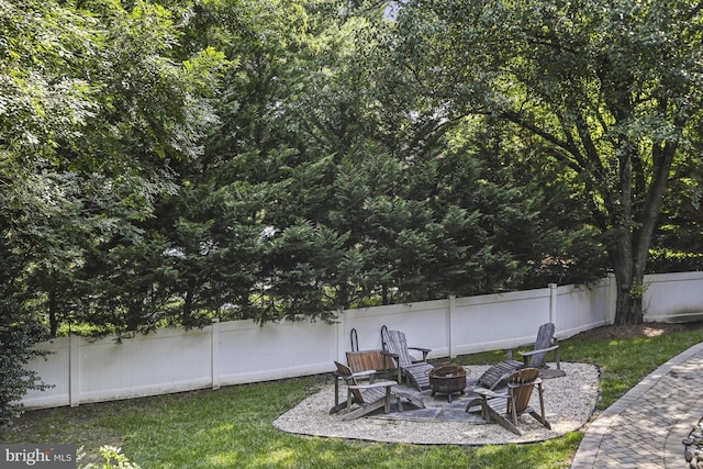 1016 Bellview Rd, Mclean, VA 22102 - fenced backyard featuring a fire pit and a patio
