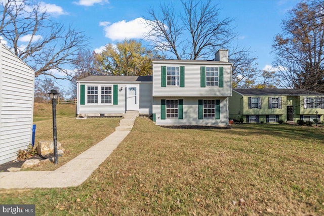 6867 Happyheart Ln, Columbia, MD 21045 - view of front facade featuring a chimney and a front yard