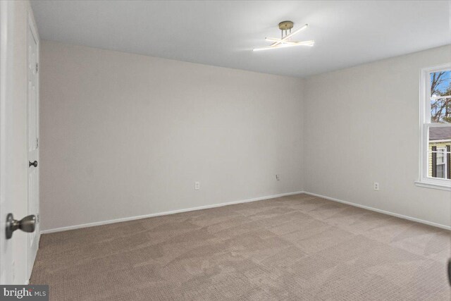 6867 Happyheart Ln, Columbia, MD 21045 - carpeted spare room featuring baseboards