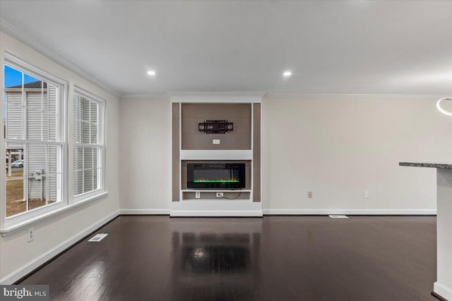 6867 Happyheart Ln, Columbia, MD 21045 - unfurnished living room featuring crown molding, wood finished floors, baseboards, and recessed lighting