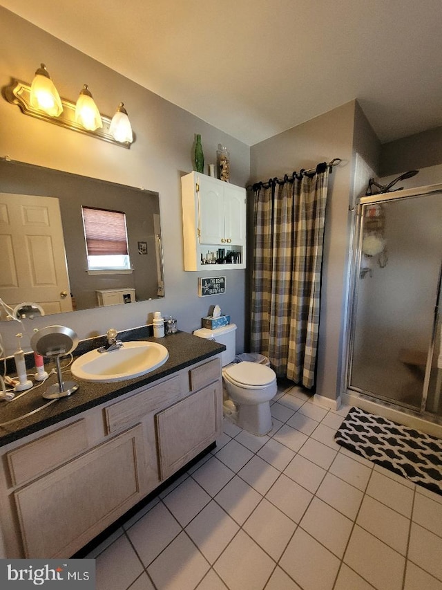 full bathroom with a stall shower, tile patterned floors, vanity, and toilet