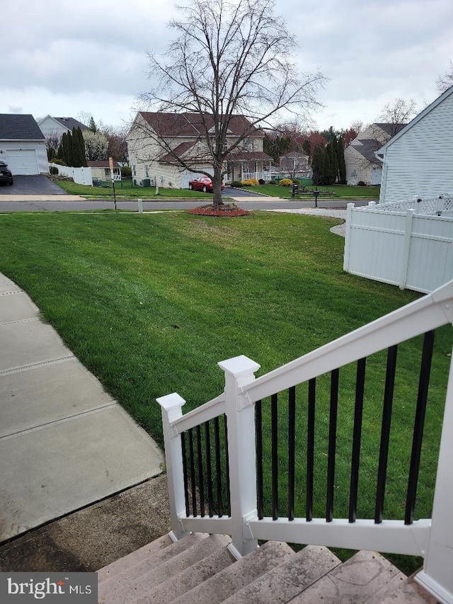 view of yard with a residential view