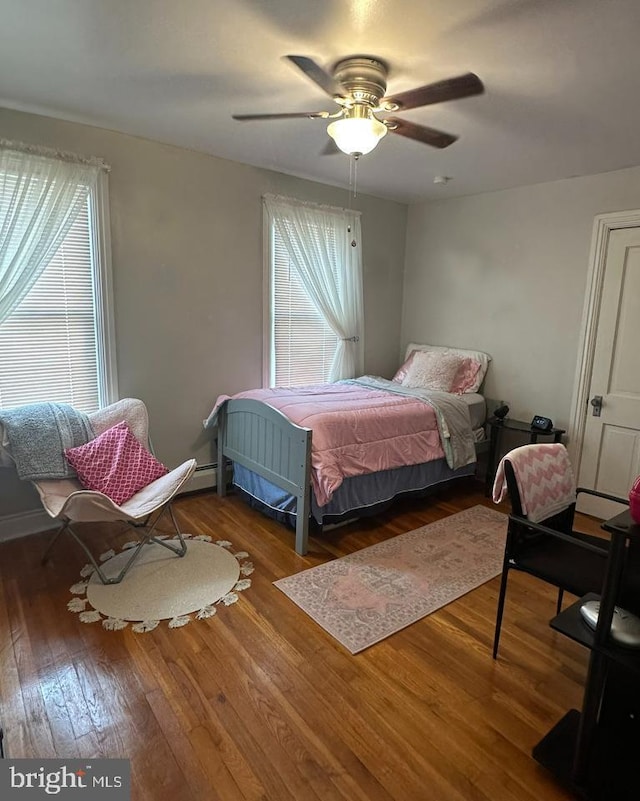 313 E Cherry St, Palmyra, PA 17078 - bedroom with wood finished floors and ceiling fan