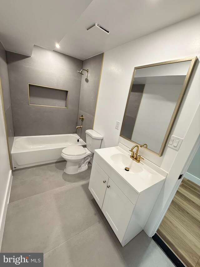 8110 Manson St, Landover, MD 20785 - bathroom with toilet, shower / washtub combination, vanity, and recessed lighting