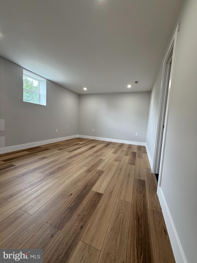 8110 Manson St, Landover, MD 20785 - unfurnished room with wood finished floors, recessed lighting, and baseboards