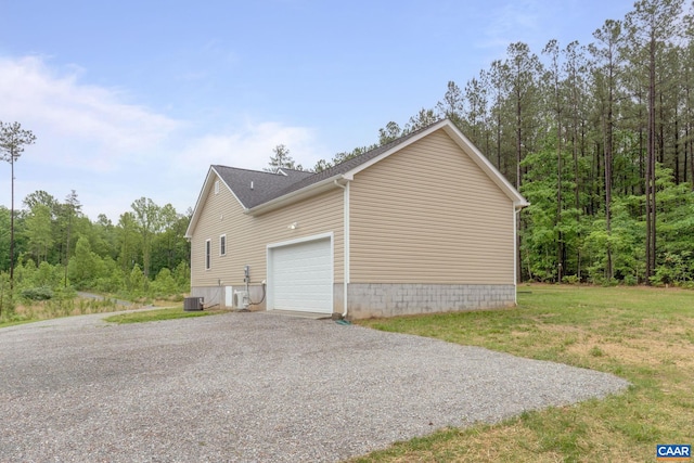 6169 Community House Rd, Columbia, VA 23038 - view of side of home featuring gravel driveway, central AC unit, and an attached garage