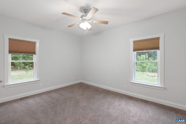 6169 Community House Rd, Columbia, VA 23038 - carpeted spare room featuring baseboards and a ceiling fan