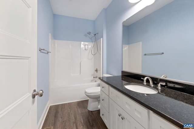 6169 Community House Rd, Columbia, VA 23038 - bathroom with toilet, wood finished floors, vanity, and shower / tub combination