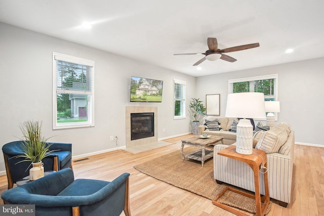 34637 Megan Ct, Lewes, DE 19958 - living room with a tile fireplace, wood finished floors, a ceiling fan, baseboards, and recessed lighting