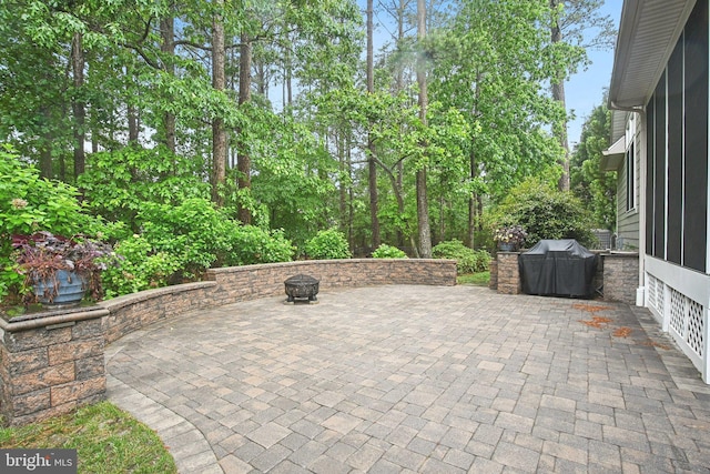 34637 Megan Ct, Lewes, DE 19958 - view of patio / terrace with grilling area and an outdoor fire pit