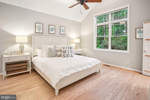 34637 Megan Ct, Lewes, DE 19958 - bedroom featuring lofted ceiling, baseboards, light wood-style floors, and a ceiling fan