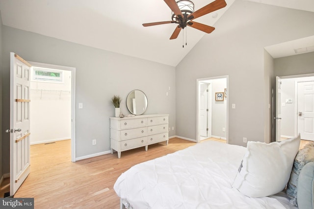 34637 Megan Ct, Lewes, DE 19958 - bedroom with high vaulted ceiling, light wood finished floors, a spacious closet, baseboards, and a ceiling fan