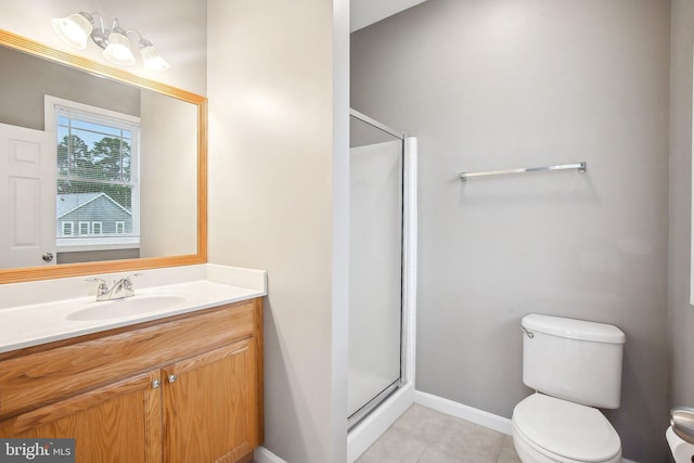 34637 Megan Ct, Lewes, DE 19958 - bathroom with toilet, a stall shower, vanity, tile patterned flooring, and baseboards