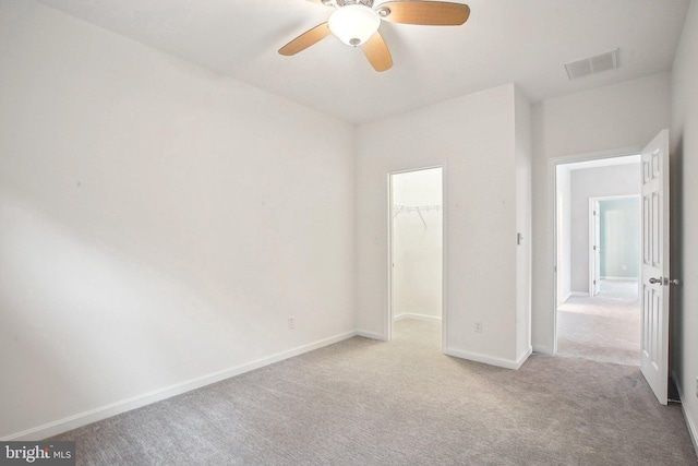34637 Megan Ct, Lewes, DE 19958 - unfurnished bedroom with carpet floors, baseboards, a spacious closet, a closet, and ceiling fan