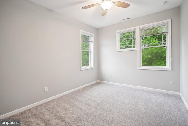 34637 Megan Ct, Lewes, DE 19958 - empty room featuring a ceiling fan, baseboards, carpet floors, and a smoke detector