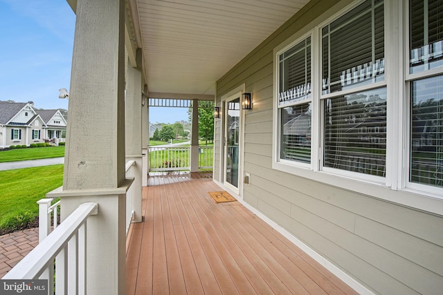 34637 Megan Ct, Lewes, DE 19958 - wooden porch with a residential view