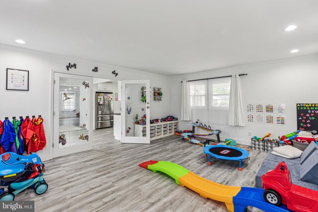 76 Torrington Ln, Willingboro, NJ 08046 - playroom with wood finished floors, crown molding, baseboards, and recessed lighting