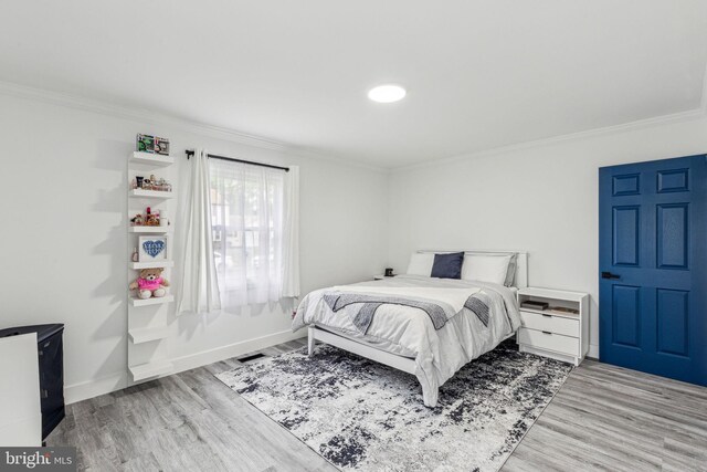 76 Torrington Ln, Willingboro, NJ 08046 - bedroom with ornamental molding, wood finished floors, and baseboards