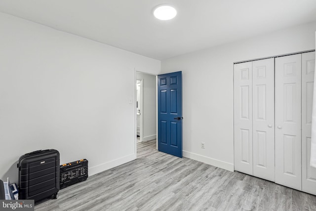 76 Torrington Ln, Willingboro, NJ 08046 - unfurnished bedroom with wood finished floors, baseboards, and a closet