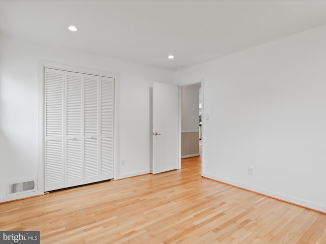 4102 Elizabeth St, Rockville, MD 20853 - unfurnished bedroom featuring wood finished floors, recessed lighting, baseboards, and a closet