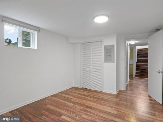 4102 Elizabeth St, Rockville, MD 20853 - unfurnished bedroom with a closet, wood finished floors, and baseboards
