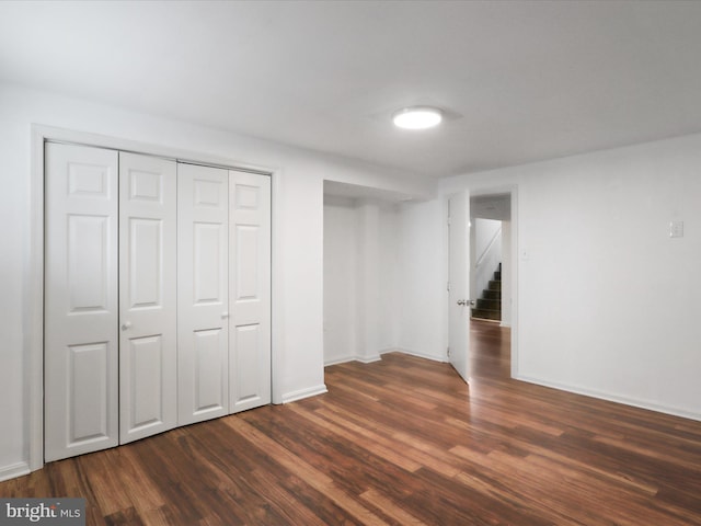 4102 Elizabeth St, Rockville, MD 20853 - unfurnished bedroom featuring dark wood-style flooring, baseboards, and a closet