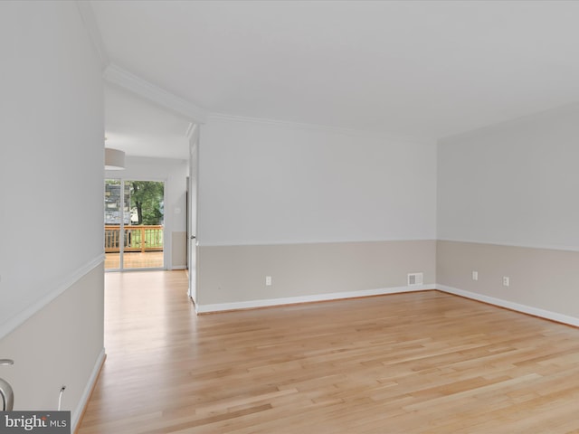 4102 Elizabeth St, Rockville, MD 20853 - empty room featuring crown molding, light wood finished floors, and baseboards