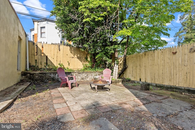 917 Foulkrod St, Philadelphia, PA 19124 - view of patio / terrace with an outdoor fire pit and a fenced backyard