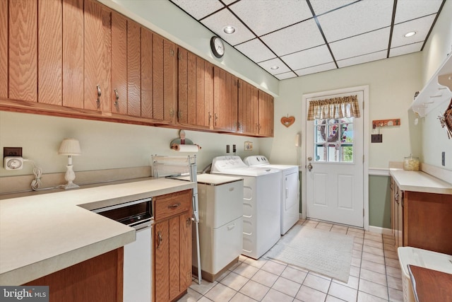 7 Taylor Ln, Doylestown, PA 18902 - laundry area featuring independent washer and dryer, cabinet space, light tile patterned floors, recessed lighting, and baseboards