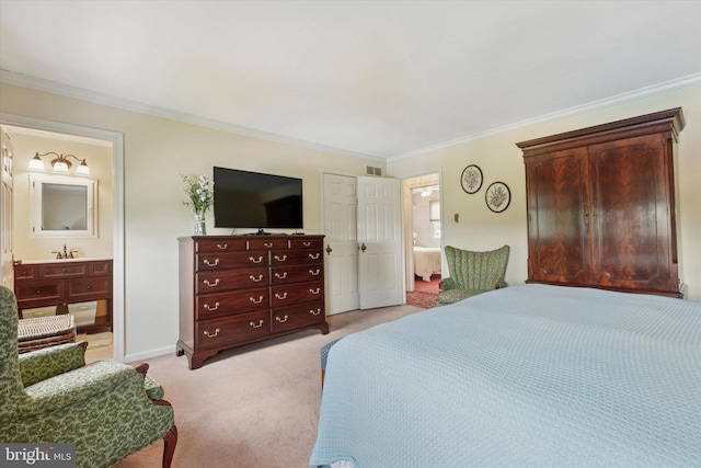 7 Taylor Ln, Doylestown, PA 18902 - bedroom featuring light carpet, ornamental molding, connected bathroom, baseboards, and a sink