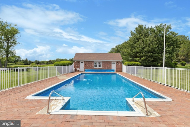 7 Taylor Ln, Doylestown, PA 18902 - view of pool featuring a storage structure, an outdoor structure, a patio, and view of wooded area