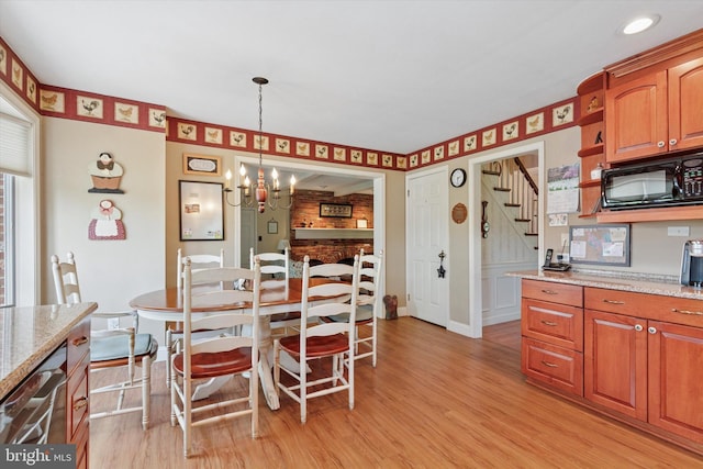 7 Taylor Ln, Doylestown, PA 18902 - dining area with stairway, a chandelier, light wood-type flooring, and baseboards