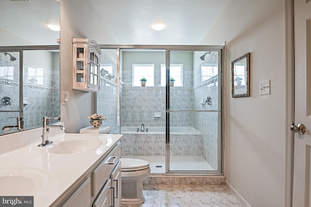 20337 Charter Oak Dr, Ashburn, VA 20147 - bathroom with toilet, a tile shower, double vanity, baseboards, and a bath