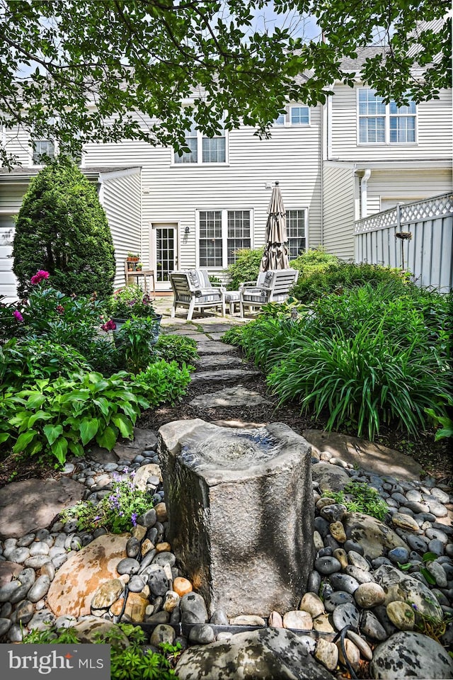 20337 Charter Oak Dr, Ashburn, VA 20147 - rear view of property with a patio